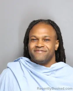 Mugshot of ADONNIS JERRELL-MARTIN TAYLOR booked in Champaign County, Illinois on May 17, 2026