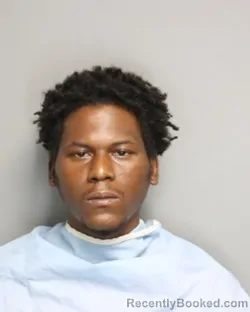 Mugshot of MYQUAN LILGRANT BROWN booked in Champaign County, Illinois on May 18, 2026