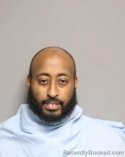 Mugshot of ABDILATIF YUSSUF ADAN booked in Champaign County, Illinois on May 19, 2026