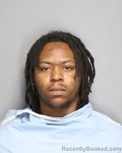 Mugshot of CHRISTIAN ISIAH DEVONN BURKS booked in Champaign County, Illinois on May 19, 2026