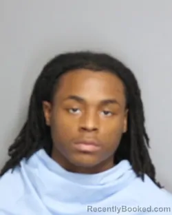 Mugshot of KENYON LAMONT DUNN booked in Champaign County, Illinois on May 21, 2026