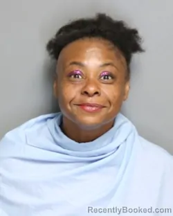 Mugshot of REGINA WILSON booked in Champaign County, Illinois on May 23, 2026