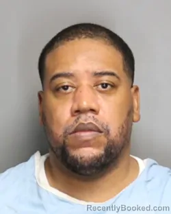 Mugshot of JAMEL DONTA MOORE booked in Champaign County, Illinois on May 23, 2026
