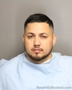 Mugshot of JOSE MIGUEL NOLASCO CAMACHO booked in Champaign County, Illinois on May 24, 2026