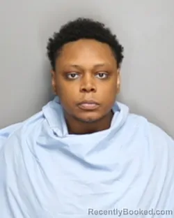 Mugshot of JAQUAWN LANTRAY DAVIS booked in Champaign County, Illinois on June 18, 2026