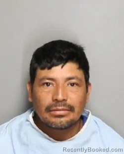 Mugshot of ALEXANDER BELTRAN CABRERA booked in Champaign County, Illinois on June 22, 2026