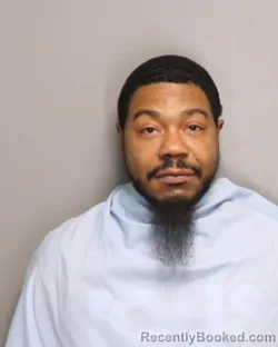 Mugshot of DEVEON UJUAN BROWN booked in Champaign County, Illinois on June 23, 2026