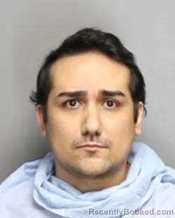 Mugshot of CRISTIAN DANIEL SANCHEZ booked in Champaign County, Illinois on June 23, 2026