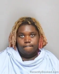 Mugshot of AKEELAH SHORON OWENS booked in Champaign County, Illinois on June 29, 2026