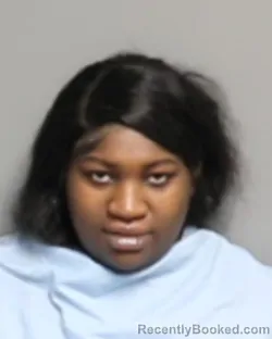 Mugshot of MAZIYAH KENYETTA NICHOLS-DORRIS booked in Champaign County, Illinois on July 2, 2026