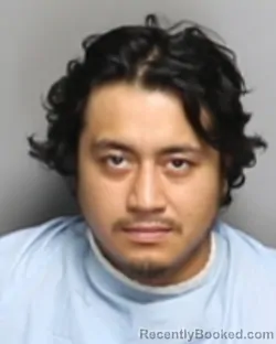 Mugshot of VICTOR MANUEL VAZQUEZ-HEREDIA booked in Champaign County, Illinois on July 3, 2026