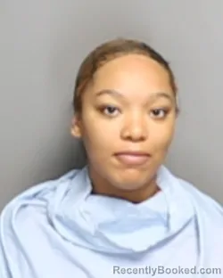 Mugshot of JEHRNIE UNIQUE GREER booked in Champaign County, Illinois on July 5, 2026