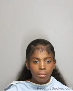 Mugshot of ANYA GENNIE SHARELL BAILEY booked in Champaign County, Illinois on July 10, 2026
