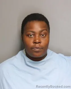 Mugshot of TYANA SHENAILLE DORSEY booked in Champaign County, Illinois on July 12, 2026
