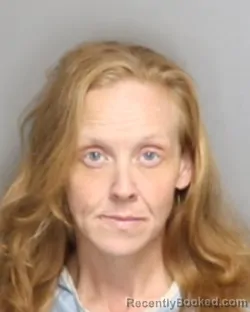 Mugshot of JENNIFER JO COOLEY booked in Champaign County, Illinois on July 14, 2026