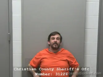 Mugshot of RAYMOND T ROGERS