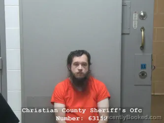 Mugshot of BRANDON E RHODES