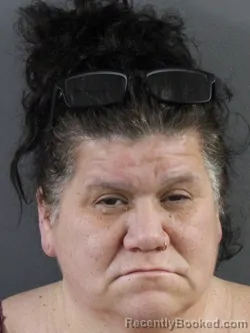 Mugshot of JOANN ROARK booked in Coles County, Illinois on March 20, 2026