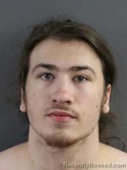 Mugshot of ELIAS MATTHEW NOWAKOWSKI booked in Coles County, Illinois on March 23, 2026