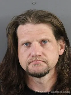 Mugshot of MICHAEL ALLEN HEAL booked in Coles County, Illinois on March 27, 2026