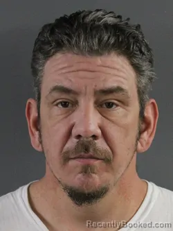 Mugshot of MICHAEL JOSEPH RODRIGUEZ booked in Coles County, Illinois on March 31, 2026