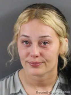 Mugshot of BRIANNA NACHELLE HARSHBARGER booked in Coles County, Illinois on March 31, 2026