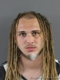 Mugshot of ZION J PEOPLES booked in Coles County, Illinois on April 4, 2026