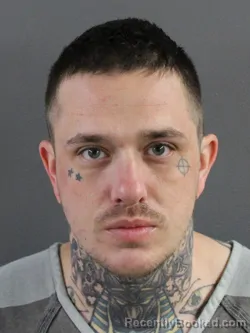 Mugshot of NATHAN LEE SCHAEFER booked in Coles County, Illinois on April 22, 2026