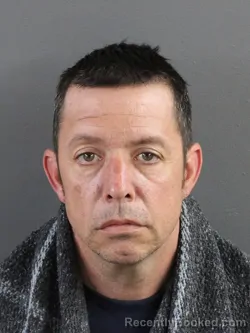 Mugshot of CHENCHO DALE GARZA booked in Coles County, Illinois on May 7, 2026