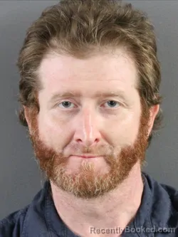 Mugshot of MICHAEL ANDREW COOK booked in Coles County, Illinois on May 18, 2026