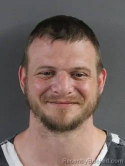 Mugshot of JORDAN NICHOLAS MYERS booked in Coles County, Illinois on July 12, 2026