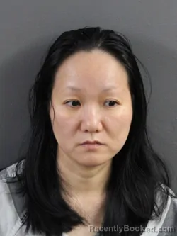 Mugshot of QUN CHEN booked in Coles County, Illinois on July 30, 2026