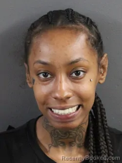 Mugshot of Jaakiya Jahara Garrett booked in Coles County, Illinois on August 18, 2026