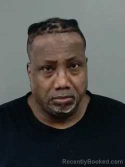 Mugshot of MICHAEL D EVANS booked in Cook County, Illinois on April 1, 2026