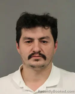 Mugshot of RUSLAN S KHALILOV booked in Cook County, Illinois on March 17, 2026