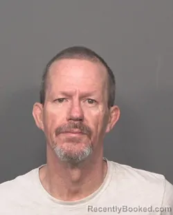 Mugshot of ARON D HACKMAN booked in DeKalb County, Illinois on March 31, 2026