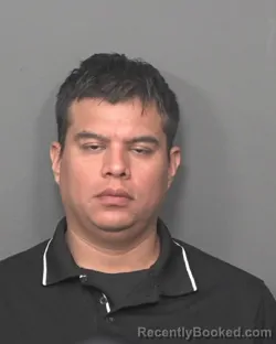 Mugshot of CARLOS A ADAUTA-MALDONADO booked in DeKalb County, Illinois on May 13, 2026