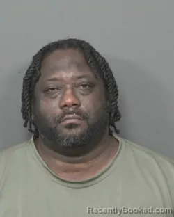 Mugshot of Tyrone Nmi Rhodes booked in DeKalb County, Illinois on August 17, 2026