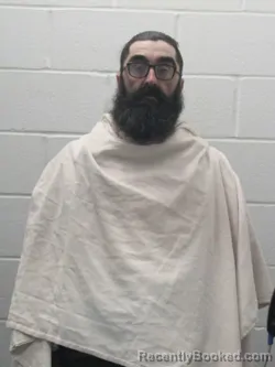 Mugshot of RYAN A DOWNEY