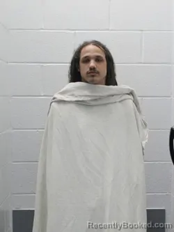 Mugshot of JUSTIN M FORRY