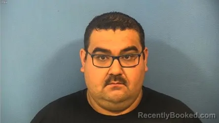 Mugshot of Adrian Guzman booked in DuPage County, Illinois on September 26, 2026