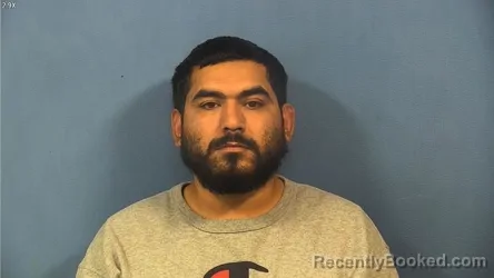 Mugshot of Alexandro Lazcano booked in DuPage County, Illinois on October 2, 2026
