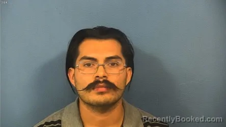 Mugshot of Axel Ruiz Basilio booked in DuPage County, Illinois on July 22, 2026