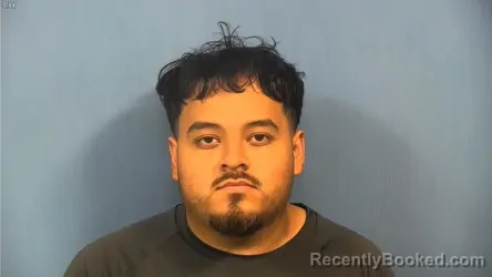 Mugshot of Arnulfo Rea Flores booked in DuPage County, Illinois on September 25, 2026