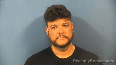 Mugshot of ALEXANDER TORRES CARRASQUILLO booked in DuPage County, Illinois on April 9, 2026