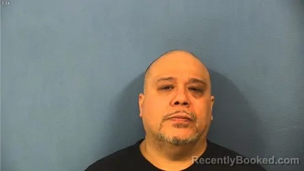 Mugshot of Alejandro Urzua booked in DuPage County, Illinois on October 8, 2026