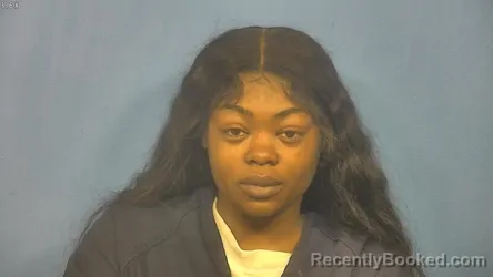 Mugshot of CHINETTA BENNETT booked in DuPage County, Illinois on June 8, 2026