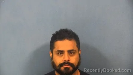 Mugshot of Carlos Delatorre booked in DuPage County, Illinois on October 15, 2026