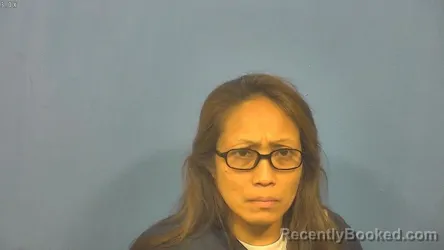 Mugshot of Christine Escudero Hontanosas booked in DuPage County, Illinois on September 22, 2026