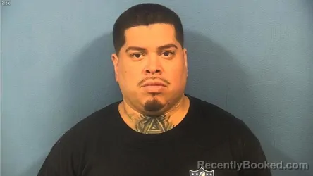 Mugshot of Candelario Saucedo booked in DuPage County, Illinois on August 11, 2026